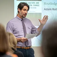 Adam Rottinghaus presents a talk on his book during last year's New Books at Miami event.