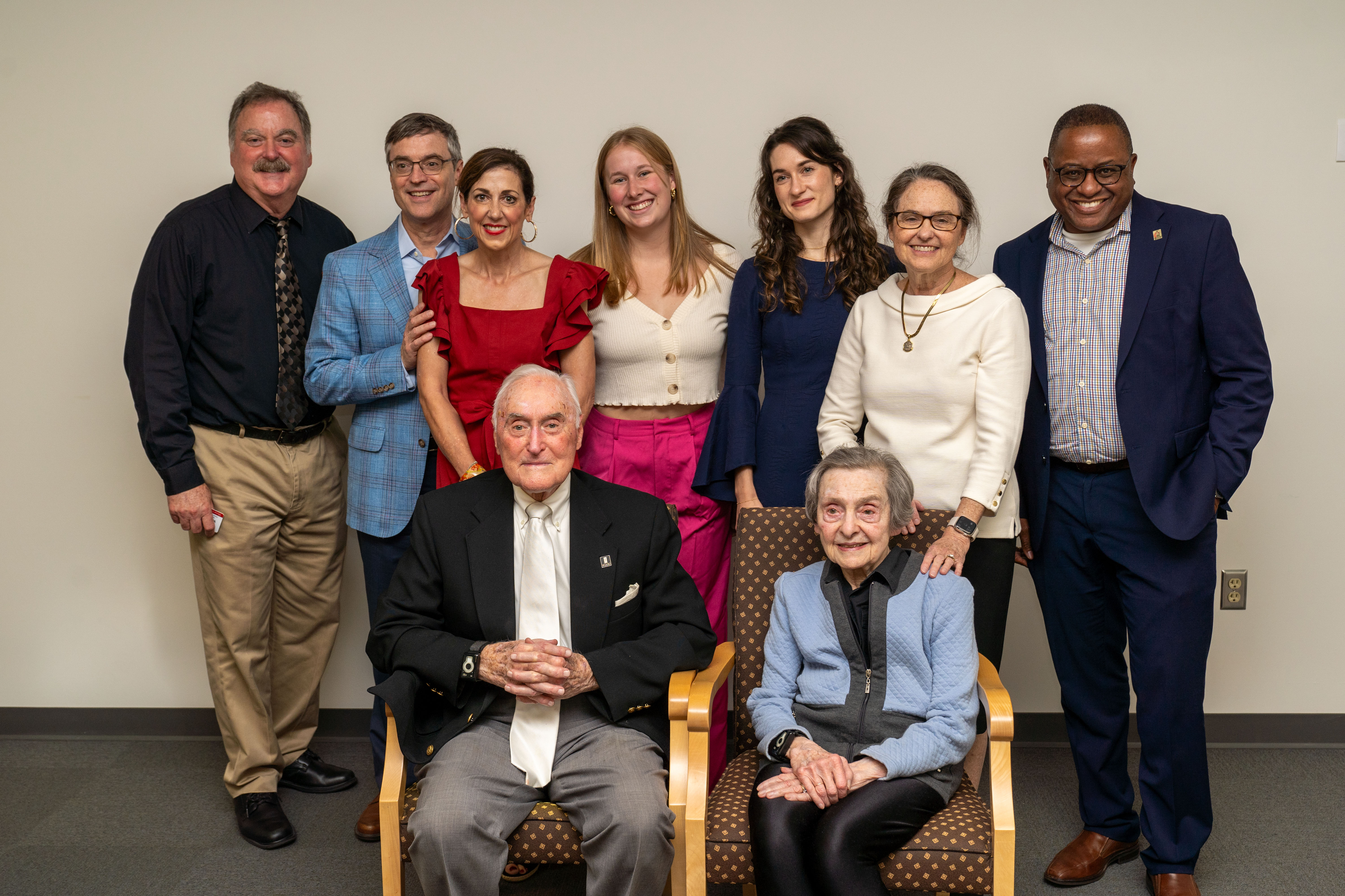 Nine people pose for a photo at King Library after the 50th anniversary of the naming of the Walter Havighurst Special Collections. The nine people include William Pratt and his family, as well as Jerome Conley, Dean of the Libraries, and William Modrow, head of the Steward and Sustain department.