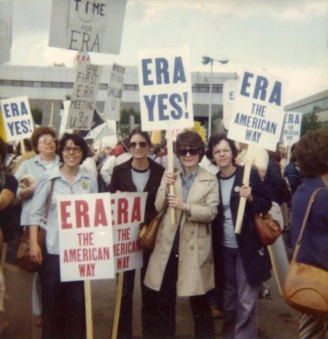 Photo of women holding signs as part of an Equal Rights Amendment demonstration
