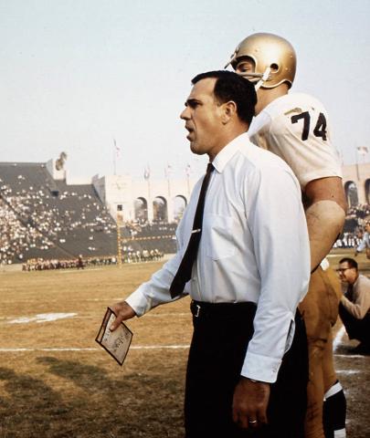 Coach Ara Parseghian on the sideline with a player